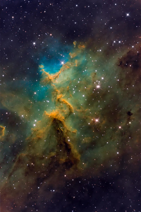 Melotte 15 star cluster at the centre of the Heart Nebula in emerald and amber tones