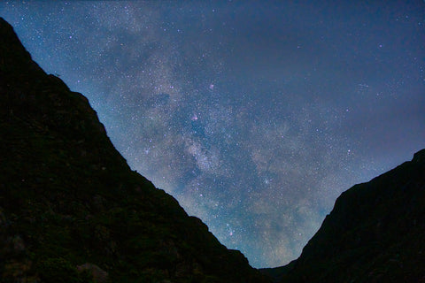 The Milky Way arching over the darkened mountains of the Gap of Dunloe, Kerry