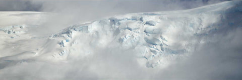 Panoramic glacier landscape with clouds and ice at Charlotte Bay, Antarctic Peninsula, fine art landscape photograph by Peter Cox