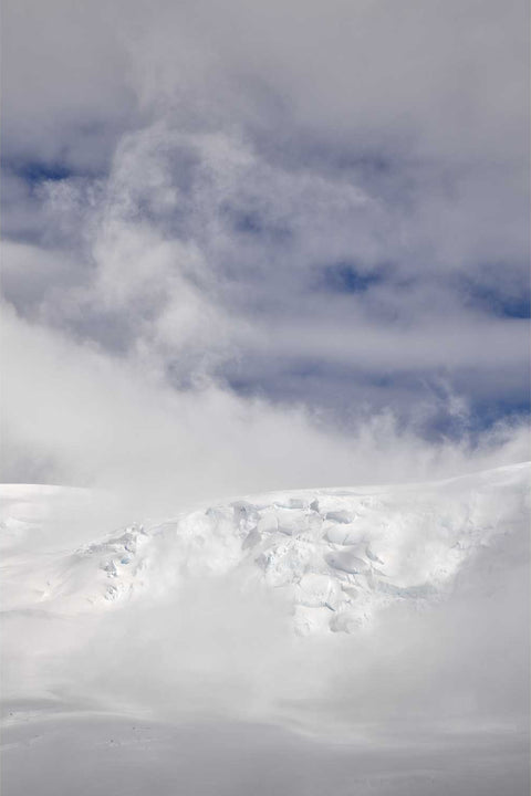 Glacier and mountains in blues and whites at Charlotte Bay, Antarctic Peninsula, fine art landscape photograph by Peter Cox