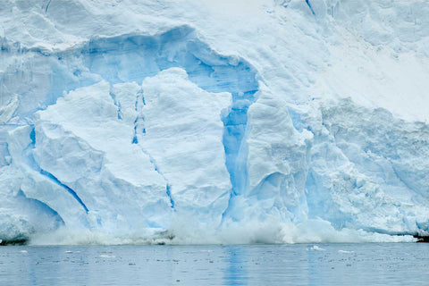 Glacier calving into tranquil waters at Cuverville Island on the Antarctic Peninsula, fine art landscape photograph by Peter Cox
