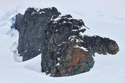 Snow-covered cliffs and glaciers at Cuverville Island, Antarctic Peninsula, fine art landscape photograph by Peter Cox