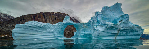 Sculpted iceberg with circular arch in Scoresby Sound, Greenland, fine art landscape photograph by Peter Cox