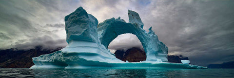 Massive iceberg with arch in the fjords of Greenland, fine art landscape photograph by Peter Cox