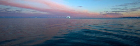 Pink and blue sunset sky over icebergs along the Greenland coast — fine art landscape photograph by Peter Cox