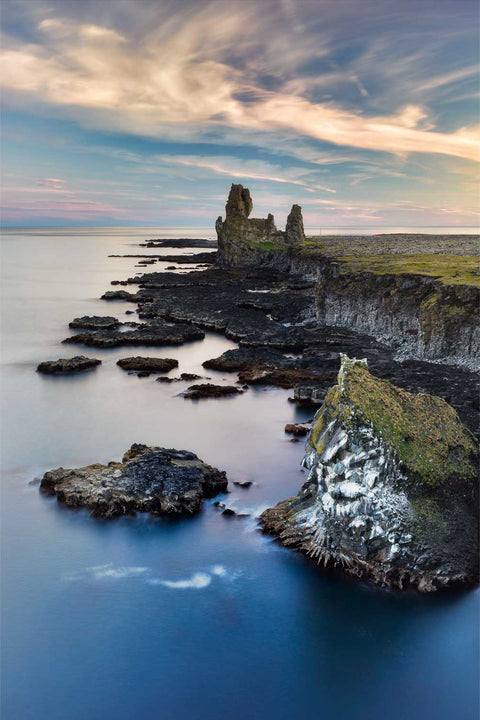 Basalt sea stacks at Thufabjarg on Iceland's Snaefellsnes Peninsula in soft twilight light