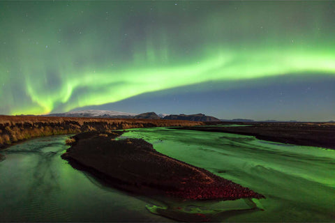 Northern lights over Katla volcano with river reflections, Iceland — fine art landscape photograph by Peter Cox