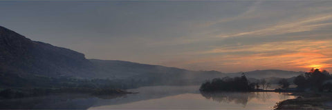 Dawn breaking over Gougane Barra Lake with mountain reflections in still water, Co. Cork — fine art landscape photograph by Peter Cox