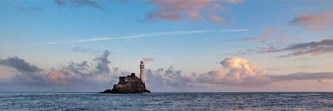 Panoramic sunset view of Fastnet Lighthouse on calm sea, Co. Cork, fine art landscape photograph by Peter Cox