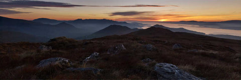 Sunset over the Kenmare River from Knockreagh summit on the Beara Peninsula with Caha Mountains on the horizon