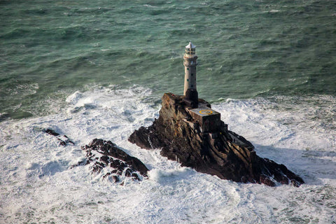 The Fastnet Lighthouse seen from directly above, perched on its Atlantic rock with swirling seas off West Cork