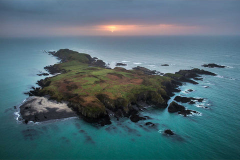 Aerial view of Rabbit Island off the coast of West Cork near Union Hall, bathed in warm sunset light