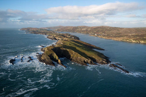 Aerial view of Streek Head headland at the entrance to Crookhaven Harbour on a clear winter morning, Cork