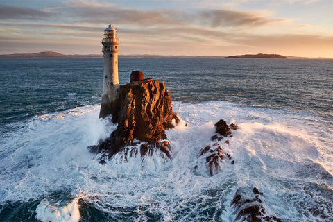 Aerial view of the Fastnet Lighthouse at dawn on a blustery day off the West Cork coast