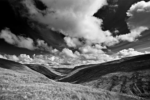 Black and white view of Glengesh Pass with a winding road through rolling hills, Co. Donegal — fine art landscape photograph by Peter Cox