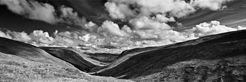 Black and white panoramic view of Glengesh Pass valley with dramatic clouds, Co. Donegal — fine art landscape photograph by Peter Cox