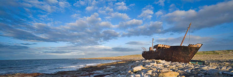 The rusting Plassey shipwreck on Inis Oirr, Aran Islands, seen from above with the Atlantic Ocean beyond