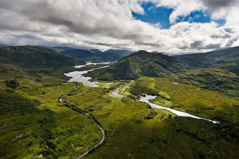 Aerial view of the Long Range river winding between mountains towards the Upper Lake in Killarney, County Kerry
