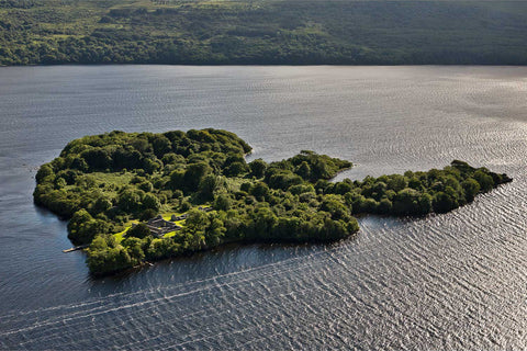 Aerial view of Inisfallen Island and its ancient monastery on Lough Leane, Killarney, Co. Kerry — fine art aerial photograph by Peter Cox