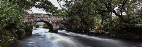 Panoramic twilight view of the Old Weir Bridge at the Meeting of the Waters in Killarney National Park, County Kerry