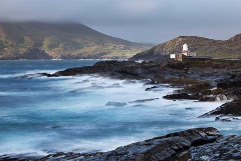 Cromwell Point lighthouse with waves crashing on rocky shore, Valentia Island, Co. Kerry, Ireland, fine art landscape photograph by Peter Cox
