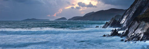 Panoramic sunset view from Slea Head with the Blasket Islands and stormy skies, Dingle Peninsula, Kerry