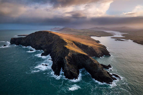 Aerial sunrise view of Valentia Island with Bray Head's cliffs in the foreground, Kerry