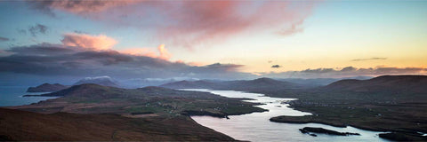 Aerial panorama of Valentia Sound with the Portmagee bridge and snow-capped MacGillycuddy's Reeks beyond