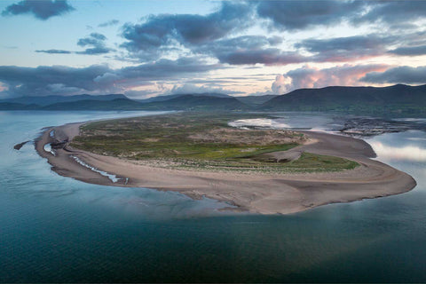 Aerial view of Inch Peninsula at sunrise showing sand spit, dunes, and wave patterns on Dingle Bay, Co. Kerry — fine art aerial photograph by Peter Cox