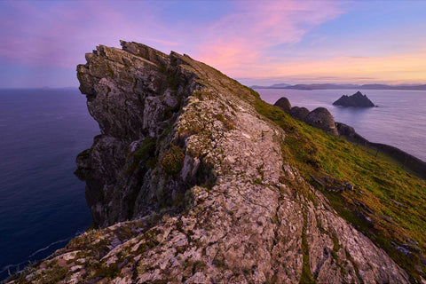 The sweeping North Peak ridge of Skellig Michael at sunrise with the ancient monastery sheltering in its lee below
