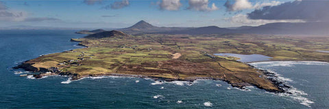 Aerial panoramic view of Roonagh Point coastline with Croagh Patrick mountain visible in the distance, County Mayo
