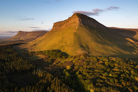Benbulben mountain bathed in sunset light, Co. Sligo, Ireland — fine art aerial landscape photograph by Peter Cox