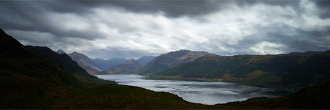 Brooding skies with light dancing over the waters of Loch Duich on the west coast of Scotland