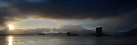 Castle Stalker at sunset on Loch Laich with warm sky reflections, Scotland, fine art landscape photograph by Peter Cox