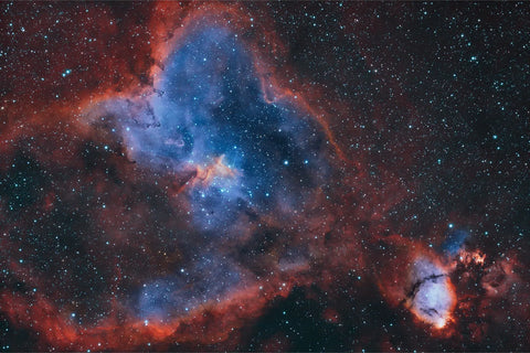 The Heart Nebula IC1805 in deep reds and blues with thousands of stars in the Perseus Arm of the Milky Way