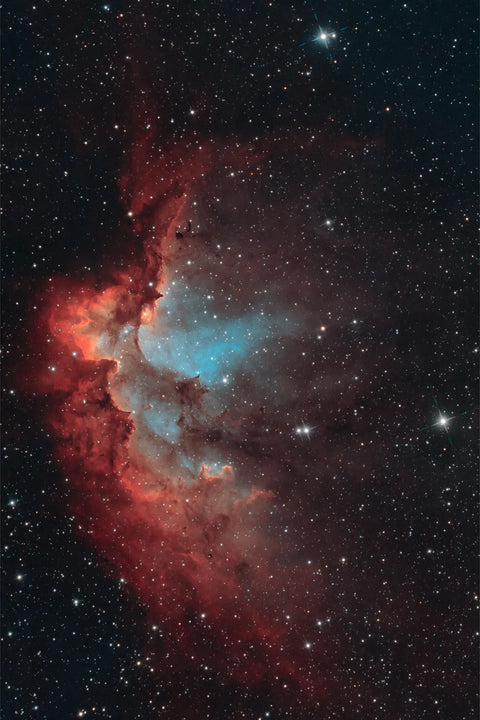 The Wizard Nebula NGC7380 in glowing reds and blues, a star-forming region in the constellation Cepheus
