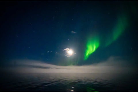 Northern lights over Scoresby Sund with moonlight and mist, Greenland — fine art landscape photograph by Peter Cox