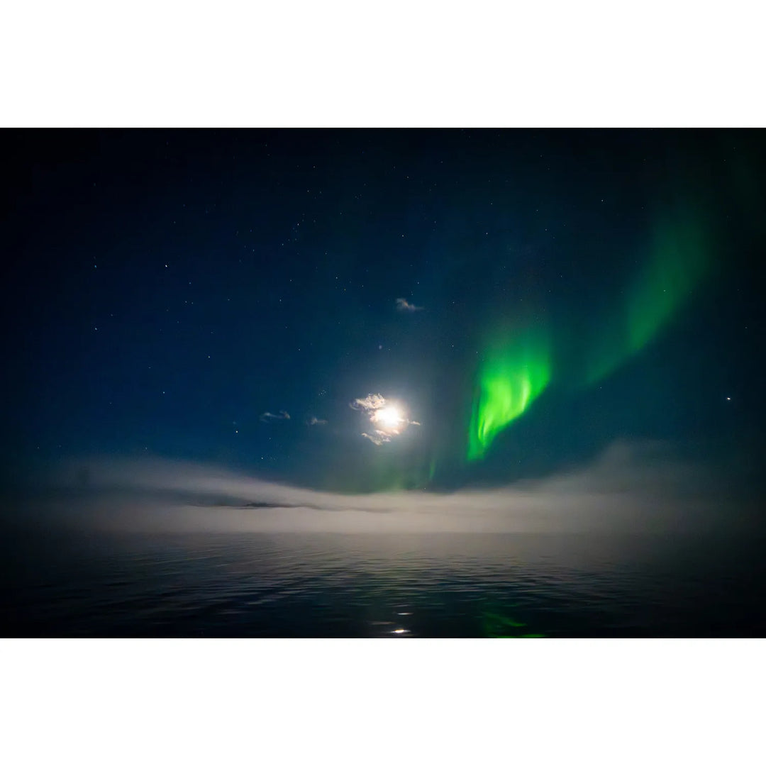 Northern lights over Scoresby Sund with moonlight and mist, Greenland — fine art landscape photograph by Peter Cox