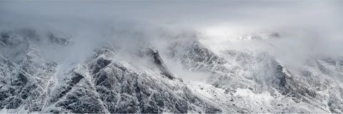 Panoramic view of snow-dusted peaks in cloud along Scoresby Sound, Greenland — fine art landscape photograph by Peter Cox